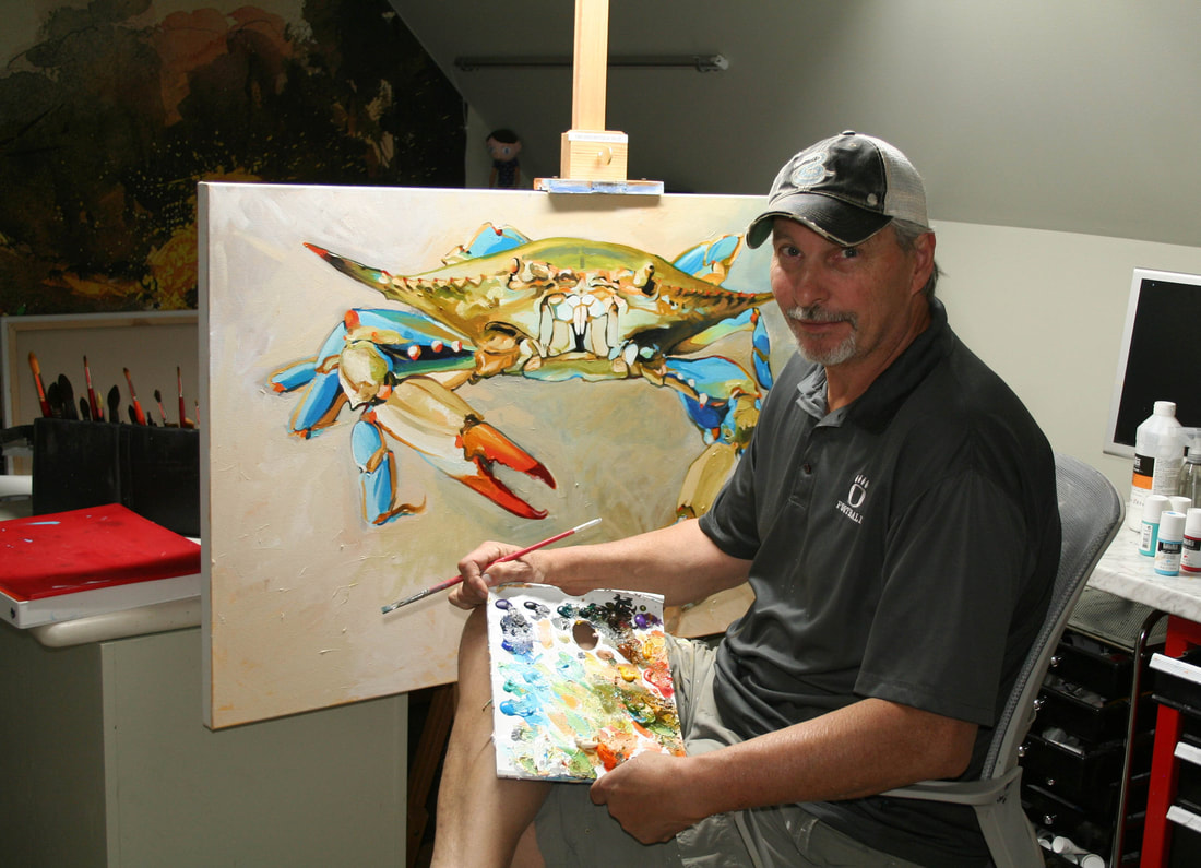 Leo Kahl with large blue crab painting